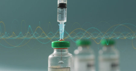 Image of diagrams over vaccine with vial. Global medicine and digital interface concept digitally...