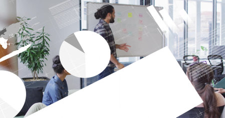 Image of financial data processing over diverse colleagues having meeting in office. Global business, finances, computing and digital interface concept digitally generated image.の写真素材