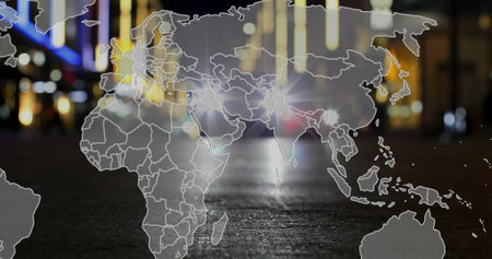 World map image over city street with blurred lights and cars. Globalization, metropolis,...