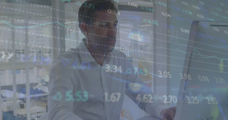 Image of financial data processing over caucasian businessman using computer in office. Global...