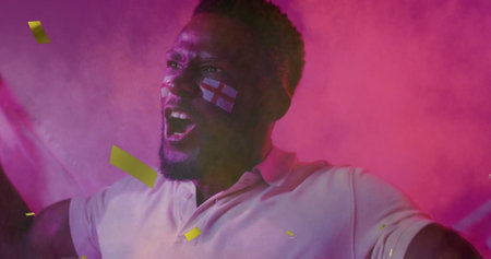 Image of confetti over african american male supporter with flags of england. Sport and digital...