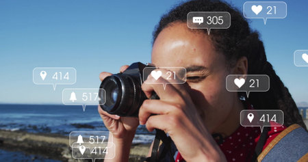 Taking photo, person with social media notifications image over coastal background. Photography, seaside, technology, smartphone, influencer, digitalの写真素材