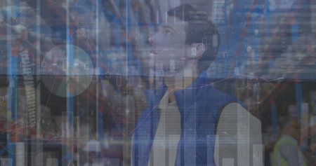 Image of financial data processing caucasian male worker in warehouse. Global business, finances and digital interface concept digitally generated image.の写真素材