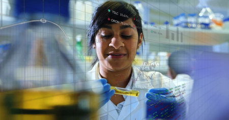 Image of scientific data processing over biracial female scientist in laboratory. Global science,...