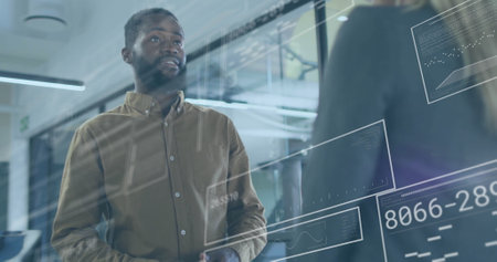 Image of financial data processing over diverse business people in office. Global finance, business,...