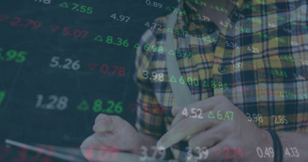 Image of stock market and diagram over caucasian businessman using smartphone. Global business and...