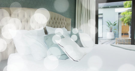Image of white spots over empty bedroom. Lifestyle, home and interface concept digitally generated...