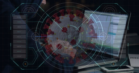 Hacker in dark hoodie working on laptop with digital virus overlay on screen. Cybersecurity, hacking, anonymous, technology, programming, malwareの写真素材