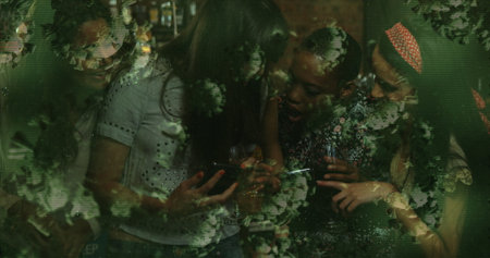 Image of cells floating over multi-ethnic group of people using smartphones. coronavirus covid-19...