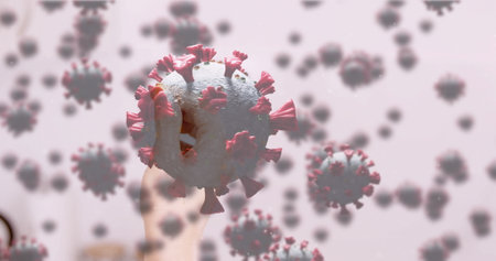 Hand holding 3D model of coronavirus, highlighting virus structure and details. Pandemic,...