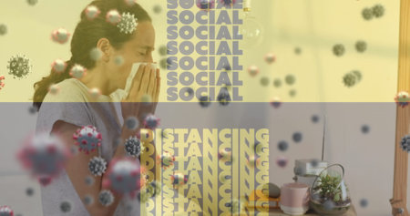 Image of words social distancing and cells moving over sick woman at home coughing and sneezing. social distancing and self isolation in quarantine lockdown digital composite.の写真素材