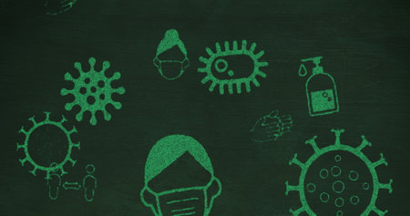 Image of covid cells and faces covered with masks on green background. Coronavirus Covid 19 pandemic concept digitally generated image.の写真素材
