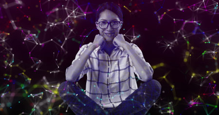 Image of portrait of smiling woman over colourful networks of connections. digital interface global...