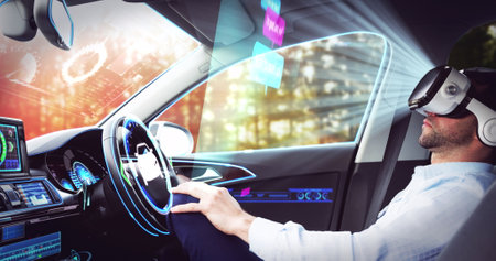 Image of icons over businessman wearing vr headset in self driving car. global network of connections and technology concept, digitally generated image.の写真素材