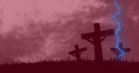 Digital composition of thunder effect over crucifix on cross against clouds in the sky. christian religion and easter conceptの写真素材