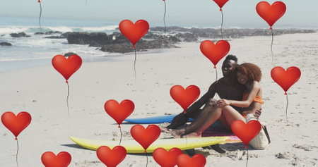 Image of heart icons over couple in love with surfboards on beach. digital interface, social media...