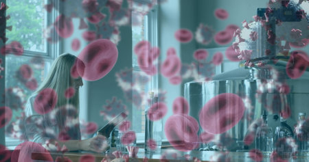 Scientist in laboratory analyzing data with digital overlay of blood cells. Research, biotechnology,...