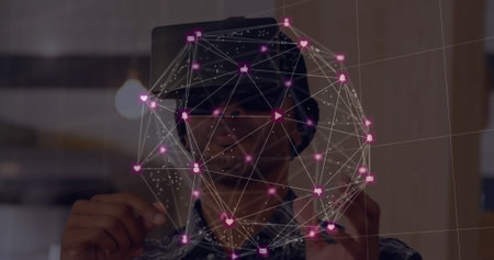 Man using virtual reality headset interacting with digital network interface. Technology,...