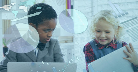 In school, children using laptops and exploring digital interfaces with curiosity. Technology,...