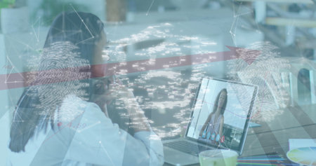 Image of online security padlock and biometric fingerprint over woman on laptop image call. global internet security, connections, technology and data processing concept digitally generated image.の写真素材