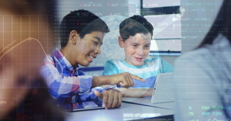 Market data processing against two male diverse students using digital tablet in class. back to school and education conceptの写真素材