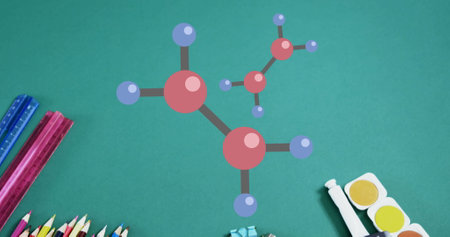 Image of 3d molecular models over stationery and school equipment on green table top. school, education and study concept digitally generated image.の写真素材