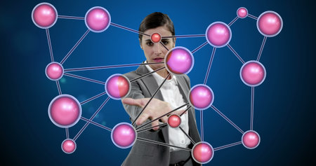 Interacting with virtual network, businesswoman exploring digital connections in office. Technology, innovation, communication, networking, professional, corporateの写真素材