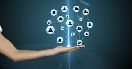 Holding digital network icons, hand representing global communication and connectivity. Technology, innovation, networking, data, futuristic, virtualの写真素材