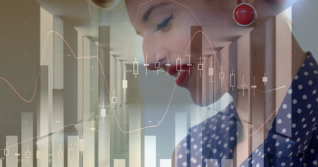 Image of statistics and data processing over woman using smartphone. global business, digital interface and technology concept digitally generated image.の写真素材