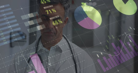 Image of statistics and data processing over male doctor. global medicine, healthcare services, digital interface and technology concept digitally generated image.の写真素材