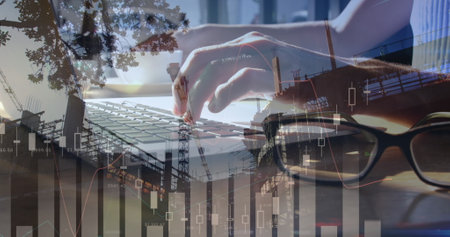 Image of statistics and data processing over man using laptop. global business, digital interface...