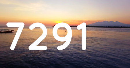 Digital image of the number in bold white text over a scenic sunset by the water. the composition...