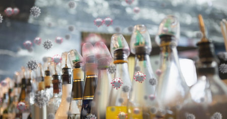 Virus cells floating with colorful syrup glass bottles in background. Pandemic, microbiology, laboratory, disease, contagion, infectionの写真素材