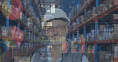 Image of statistics and financial data processing over man working in warehouse. global shipping and connections concept digitally generated image.の写真素材
