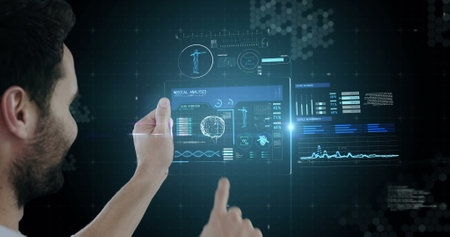 Using futuristic digital tablet, man exploring new technology in virtual environment. innovation,...