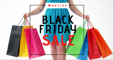 Woman holding colorful shopping bags promoting massive Black Friday sale event. retail, discount, consumerism, promotion, celebrationの写真素材