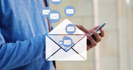 Person using smartphone for sending emails, focusing on communication technology. digital,...