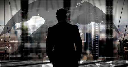 Image of businessman over information and data processing on interface. digital interface technology, data processing and global communication concept digitally generated image.の写真素材