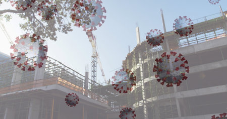 Cranes at construction site with virus illustrations, symbolizing pandemic's impact....