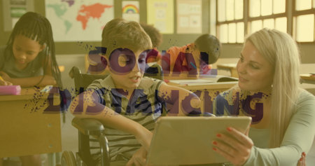 Social distancing text against female teacher and disable boy using digital tablet at school....
