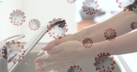 Washing hands thoroughly under running water, focusing on hygiene and virus prevention. Sanitization, cleanliness, handwashing, protection, health, germsの写真素材