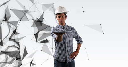 Image of network of connections over male architect holding tablet on white background. global...