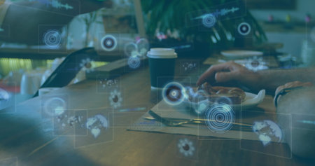 Image of scopes scanning and data processing on screens over payment with terminal. global connections, technology and digital interface concept digitally generated image.の写真素材