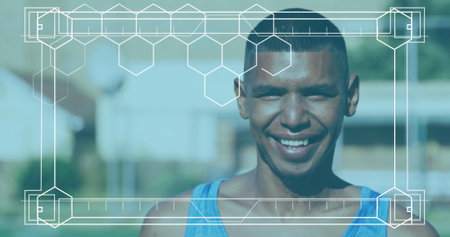 Image of frame with markers over portrait of smiling male football player. fitness, sport and competition concept digitally generated image.の写真素材