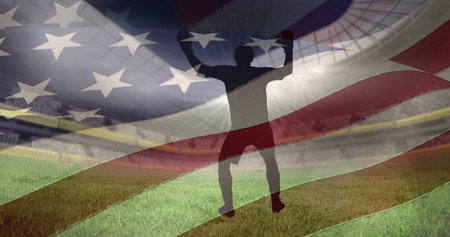 Waving us flag over silhouettes of male soccer player in different poses against sports stadium. sports competition and tournament conceptの写真素材