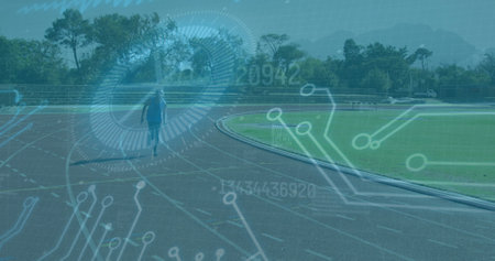Image of data processing over disabled male athlete with running blades on racing track. global sports, disability and technology concept digitally generated image.の写真素材