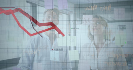Image of financial data processing with red lines over businessman and businesswoman. global...