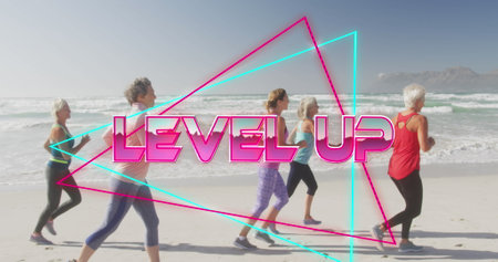 Image of text level up, in shiny pink, with women running on beach. positive feelings and wellbeing...