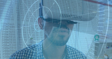 Image of scope scanning and binary coding over man wearing vr headset. global data processing,...
