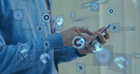 Image of scopes scanning and data processing on screens over man using smartphone. global connections, technology and digital interface concept digitally generated image.の写真素材